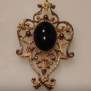 Elegant Gold Tone Brooch